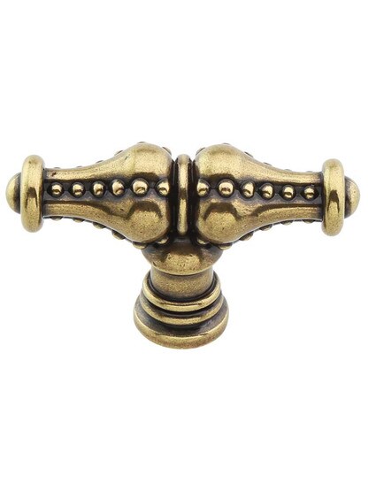 Prestige 2 1/4 inch Beaded Cabinet Knob in Distressed Antique Brass.
